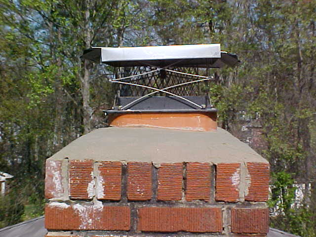 repaired chimney crown with damper