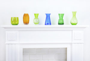 glass vases on mantel